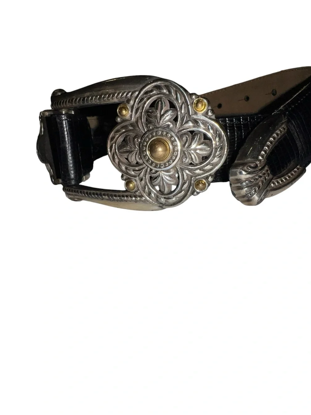 Brighton black snake skin style belt with intricate silver buckle.